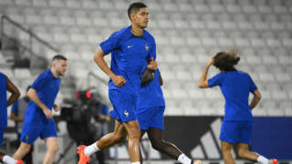 France's defender Raphael Varane takes part in a training session at Al Sadd SC Stadium in Doha on November 25, 2022, on the eve of the Qatar 2022 World Cup football tournament Group D match between France and Denmark. (Photo by FRANCK FIFE / AFP)