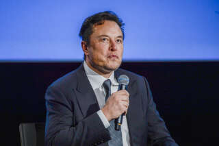 Tesla CEO Elon Musk looks up as he addresses guests at the Offshore Northern Seas 2022 (ONS) meeting in Stavanger, Norway on August 29, 2022. - The meeting, held in Stavanger from August 29 to September 1, 2022, presents the latest developments in Norway and internationally related to the energy, oil and gas sector. (Photo by Carina Johansen / NTB / AFP) / Norway OUT