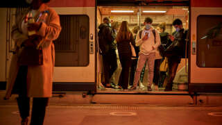 PARIS, FRANCE - OCTOBER 05: Commuters crowd into one of the RER trains running as transport networks in Paris are disrupted as workers throughout France strike as part of the nationwide strike on October 05, 2021 in Paris, France. Major trade unions and youth organisations are calling for better pay and working conditions, an end to austerity measures and job insecurity. (Photo by Kiran Ridley/Getty Images)