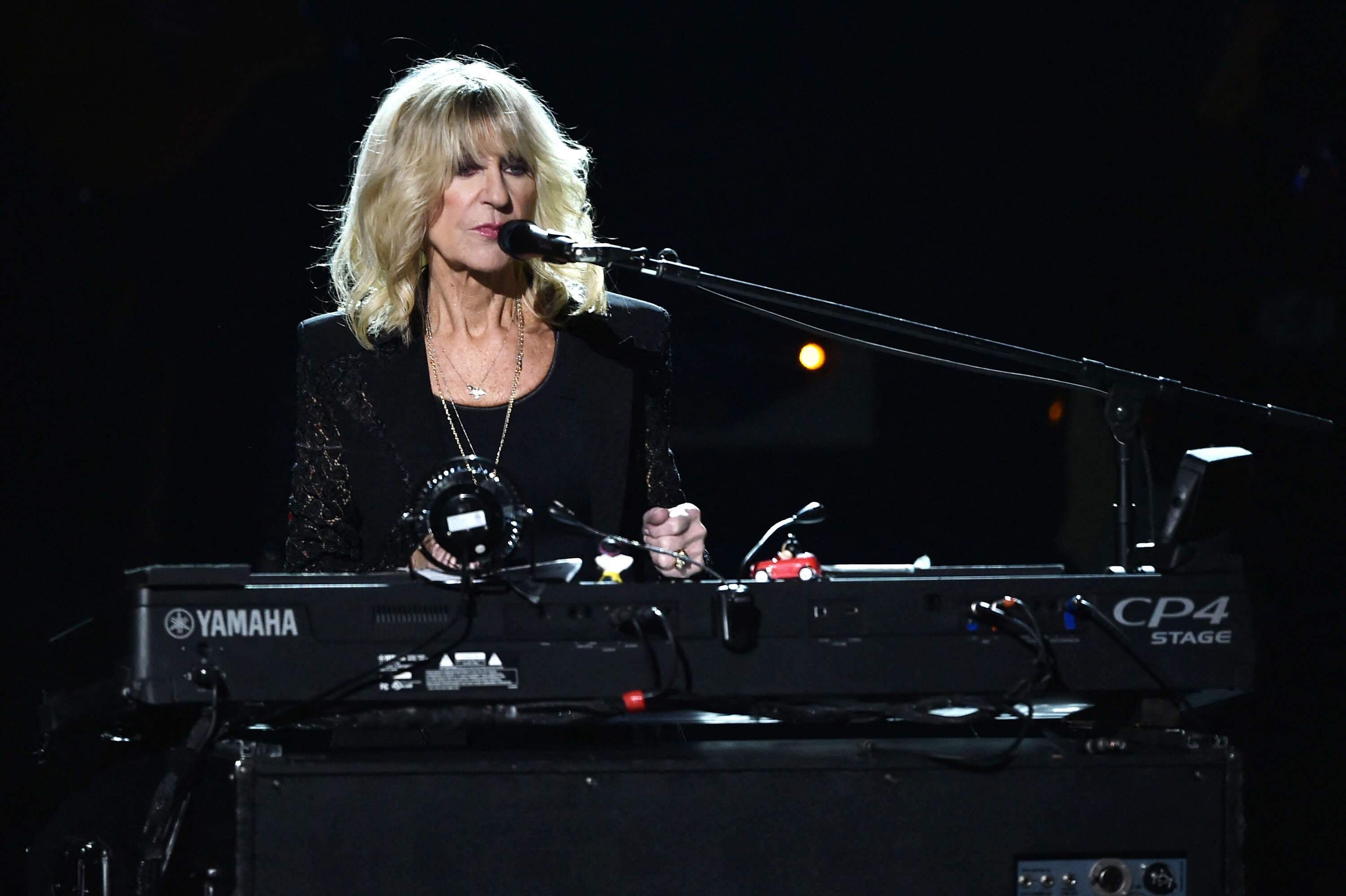 (FILES) In this file photo taken on January 26, 2018 honoree Christine McVie of music group Fleetwood Mac performs onstage during MusiCares Person of the Year honoring Fleetwood Mac at Radio City Music Hall in New York City. - Christine McVie, the English hitmaker and keyboardist who found fame in the 1970s as a member of Fleetwood Mac, died on November 30, 2022, the band and her family said. She was 79 years old. (Photo by Steven Ferdman / GETTY IMAGES NORTH AMERICA / AFP)