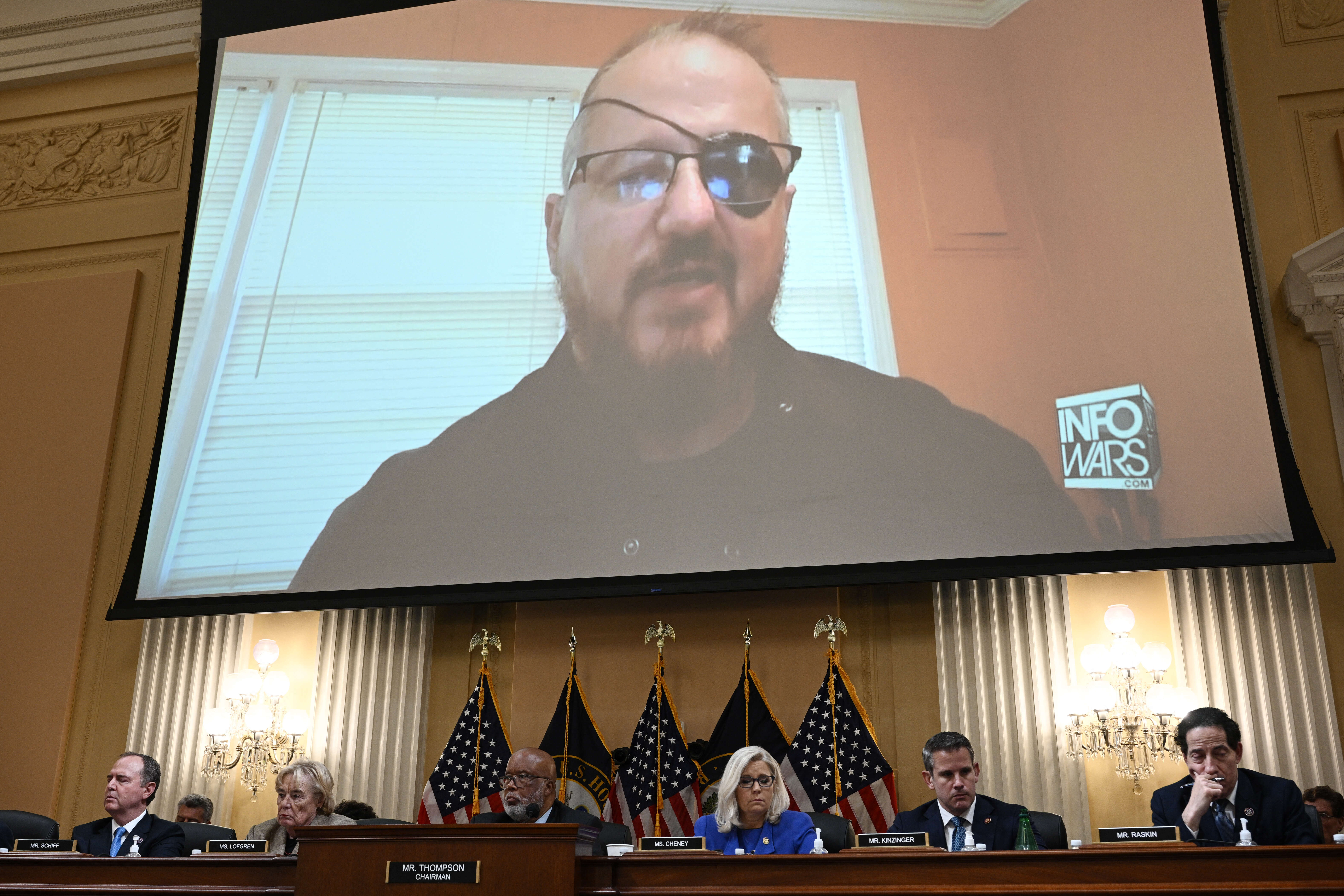 (FILES) In this file photo taken on June 9, 2022 Stewart Rhodes, founder of the Oath Keepers, is seen on a screen during a House Select Committee hearing to Investigate the January 6th Attack on the US Capitol, in the Cannon House Office Building on Capitol Hill in Washington, DC. - Stewart Rhodes, founder of the far-right Oath Keepers militia, was found guilty of sedition on November 29, 2022 for his role in the January 6, 2021 attack on the US Capitol by supporters of former president Donald Trump. (Photo by Brendan SMIALOWSKI / AFP)