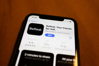 BeReal on the App Store displayed on a phone screen is seen in this illustration photo taken in Poland on August 7, 2022. (Photo by Jakub Porzycki/NurPhoto via Getty Images)