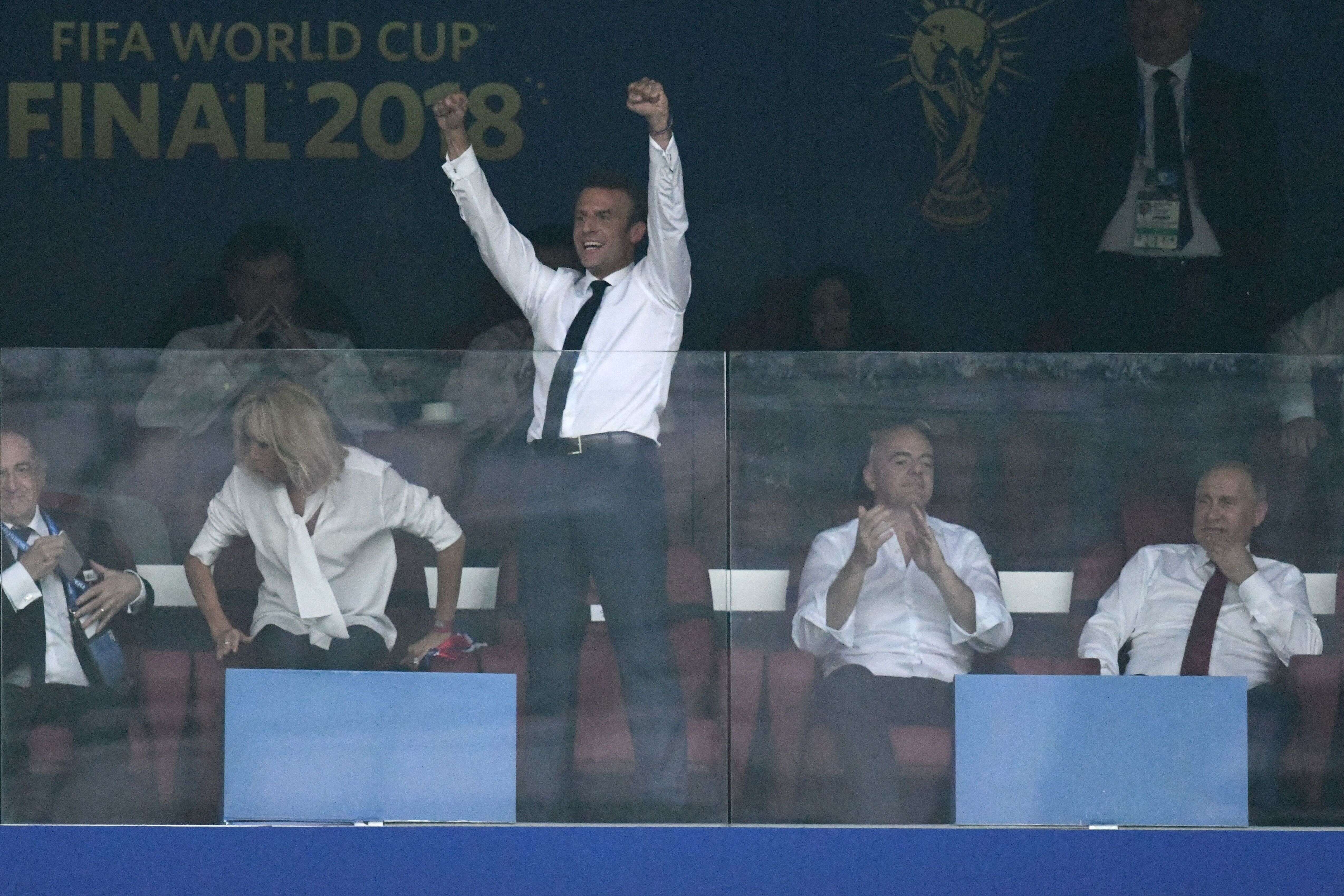 French President Emmanuel Macron celebrates his team's goal during the Russia 2018 World Cup final football match between France and Croatia at the Luzhniki Stadium in Moscow on July 15, 2018. (Photo by Christophe SIMON / AFP) / RESTRICTED TO EDITORIAL USE - NO MOBILE PUSH ALERTS/DOWNLOADS