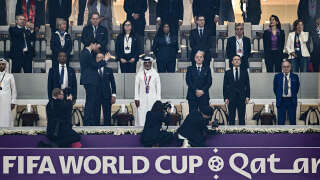 (From C, L-R) The president of the Qatar Football Association Hamad Bin Khalifa Bin Ahmed Al-Thani, FIFA President Gianni Infantino, French President Emmanuel Macron and the president of the French Football Federation, Noël Le Graët, wait for the start of the Qatar 2022 World Cup semi-final football match between France and Morocco at the Al-Bayt Stadium in Al Khor, north of Doha on December 14, 2022. (Photo by GABRIEL BOUYS / AFP)