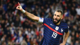 (FILES) This file photo taken on November 13, 2021 shows France's forward Karim Benzema celebratingh after scoring a goal during the FIFA World Cup 2022 qualification football match between France and Kazakhstan at the Parc des Princes stadium in Paris. (Photo by FRANCK FIFE / AFP)