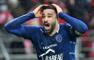 Troyes' French defender Adil Rami reacts during the French L1 football match between Stade Brestois 29 and Troyes at the Francis-Le Ble stadium, in Brest, western France, on February 13, 2022. (Photo by Fred TANNEAU / AFP)