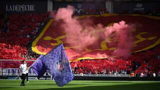 A TFC flag is pictured before the French L1 football match between Toulouse FC and Montpellier Herault SC at stadium TFC in Toulouse on October 2, 2022. (Photo by Lionel BONAVENTURE / AFP)