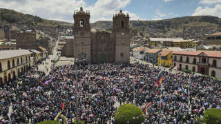 Hundreds of protesters gather at the main plaza in the Andes city of Puno, in southern Peru, in support of ousted president Pedro Castillo on January 9, 2023. - Political upheaval has roiled Peru since then-president Pedro Castillo in early December sought to dissolve Congress and rule by decree, only to be ousted and thrown in jail. Castillo's was replaced by his vice president, Dina Boluarte, who since then has faced a wave of often violent demonstrations calling for his return to power. (Photo by Juan Carlos CISNEROS / AFP)