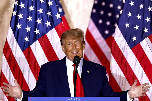 Former US President Donald Trump speaks at the Mar-a-Lago Club in Palm Beach, Florida, on November 15, 2022. - Donald Trump pulled the trigger on a third White House run on November 15, setting the stage for a bruising Republican nomination battle after a poor midterm election showing by his hand-picked candidates weakened his grip on the party. Trump filed his official candidacy papers with the US election authority moments before he was due to publicly announce his candidacy. (Photo by ALON SKUY / AFP)