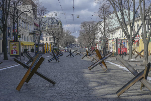 (FILES) This file photo taken on March 13, 2022, shows anti-tank obstacles laid out along a street in the southern Ukrainian city of Odessa. - The UN cultural agency on January 25, 2023, added the historic centre of Ukraine's port city of Odessa to its World Heritage List despite opposition from Russia. (Photo by BULENT KILIC / AFP)