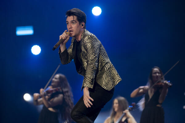 US singer Brendon Urie of Panic! at the Disco performs during Rock in Rio festival, Olympic Park, Rio de Janeiro, Brazil, on October 03, 2019. - The week-long Rock in Rio festival started September 27, with international stars as headliners, over 700,000 spectators and social actions including the preservation of the Amazon. (Photo by MAURO PIMENTEL / AFP)
