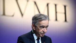 World's top luxury group LVMH head Bernard Arnault presents the group's annual results 2022 in Paris on January 26, 2023. - LVMH said that its sales and net profit both hit new heights last year, driven by strong demand in Europe and the United States. Sales came in at 79 billion euros ($86 billion) and net profit at 14 billion euros for 2022 -- both new records for the group, whose brands include Bulgari, Givenchy, Louis Vuitton, and TAG Heuer. (Photo by Stefano Rellandini / AFP)
