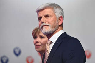 Presidential candidate Petr Pavel, former Chief of the General Staff of the Czech Army, and his wife Eva arrive for a press conference in Prague, Czech Republic on January 28, 2023, after Pavel became the fourth president of the Czech Republic according to official results. - Pavel, a former paratrooper, won 58 percent of votes while Andrej Babis scored 42 percent, with 99 percent of the vote counted, according to the Czech Statistical Office. (Photo by Michal Cizek / AFP)