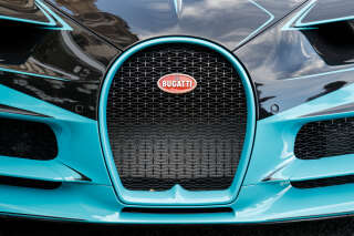 This photograph taken on September 8, 2022 shows the front of a Bugatti Chiron sports car parked in front of 