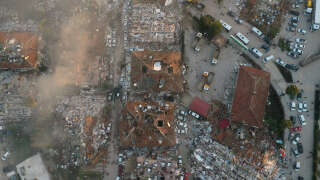 An aerial view of collapsed buildings following an earthquake in Hatay, Turkey February 7, 2023. REUTERS/Umit Bektas