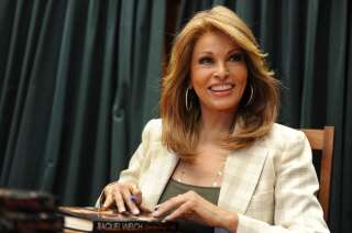 (FILES) In this file photo taken on April 21, 2010 US actress Raquel Welch signs copies of her book 