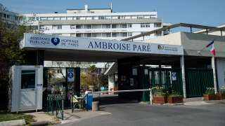 A picture taken on March 27, 2020, shows the entrance of Ambroise Pare hospital in Boulogne-Billancourt, as the country is under lockdown to stop the spread of the Covid-19 pandemic caused by the novel coronavirus. (Photo by BERTRAND GUAY / AFP)