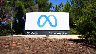 The Meta (formerly Facebook) logo marks the entrance of their corporate headquarters in Menlo Park, California on November 09, 2022. - Facebook owner Meta will lay off more than 11,000 of its staff in 