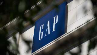 LOS ANGELES, CA - SEPTEMBER 20: A Gap retail store sign on September 20, 2022 in Los Angeles, California. Gap Inc. is set to cut about 500 corporate jobs as the clothing retailer faces cutbacks due to declining sales, as well as Kanye West ending Yeezy's partnership with Gap Inc.   Allison Dinner/Getty Images/AFP (Photo by Allison Dinner / GETTY IMAGES NORTH AMERICA / Getty Images via AFP)