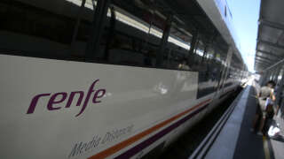 A train of the Spanish state-owned rail company Renfe, is pictured at the Principe Pio train station in Madrid, on September 5, 2019. (Photo by GABRIEL BOUYS / AFP)
