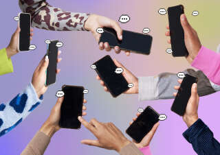 Hands holding smartphones with speech bubbles