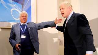 Stanley Johnson (L), father of Conservative MP Boris Johnson, congratulates his son after he delivered his Conservative Party leadership campaign launch in London on June 12, 2019. - Boris Johnson launched his campaign Wednesday to replace Theresa May as Britain's next leader, as lawmakers moved to stop him and other hardliners from delivering a 