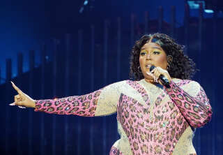 20 February 2023, Hamburg: US singer Lizzo sings on stage at Barclays Arena. (recrop) Photo: Marcus Brandt/dpa (Photo by Marcus Brandt/picture alliance via Getty Images)