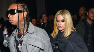 PARIS, FRANCE - MARCH 06: Tyga (L) and Avril Lavigne attend the Mugler x Hunter Schafer party as part of Paris Fashion Week at Pavillon des Invalides on March 06, 2023 in Paris, France. (Photo by Arnold Jerocki/Getty Images)