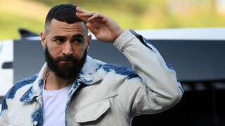 France's forward Karim Benzema arrives for a get-together, two days before the French national team leave for the upcoming Qatar 2022 World Cup football tournament, at the team's training ground in Clairefontaine-en-Yvelines, outside Paris on November 14, 2022. - The week-long countdown to the World Cup in Qatar begins as the world's leading footballers focused their attention on one of the most controversial tournaments in history. The first World Cup to be held in the Arab world will kick off on November 20, 2022, when the host nation face Ecuador. (Photo by FRANCK FIFE / AFP)