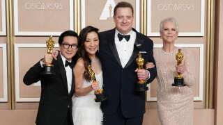 HOLLYWOOD, CALIFORNIA - MARCH 12: (L-R) Ke Huy Quan, winner of the Best Actor In A Supporting Role award, Michelle Yeoh, winner of the Best Actress in a Leading Role award, Brendan Fraser, winner of the Best Actor in a Leading Role award for 