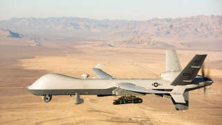 (FILES) In this file photo taken on November 07, 2020 This handout photo courtesy of the US Air Force obtained on November 7, 2020 shows an MQ-9 Reaper unmanned aerial vehicle (UAV or drone) flying over the Nevada Test and Training Range on January 14, 2020. - The United States on Tuesday condemned a Russian jet's 
