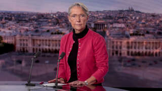 French Prime Minister Elisabeth Borne poses prior to taking part in the evening news broadcast of French TV channel TF1 in Boulogne-Billancourt, outside Paris, on October 16, 2022. (Photo by Geoffroy VAN DER HASSELT / AFP)