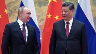 (FILES) In this file photo taken on February 04, 2022 Russian President Vladimir Putin (L) and Chinese President Xi Jinping pose for a photograph during their meeting in Beijing. - Russia has found itself in an unequal relationship with China since intensifying its pivot toward Beijing after Western countries imposed sanctions on Moscow following the assault on Ukraine. Since then, bilateral trade between the two neighbours has reached a record $190 billion and the proportion of Russian foreign trade carried out in yuan has gone from 0.5 percent to 16 percent. Russian President Vladimir Putin is now preparing to host Chinese leader Xi Jinping next week. The two last met when Putin visited Beijing three weeks before launching his campaign in Ukraine. Ties between the two countries are particularly strong in the energy sector, which has been heavily targeted by Western sanctions. (Photo by Alexei Druzhinin / Sputnik / AFP)
