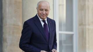 Le président du Conseil constitutionnel Laurent Fabius, quittant l’Élysée le 8 amrs 2022.