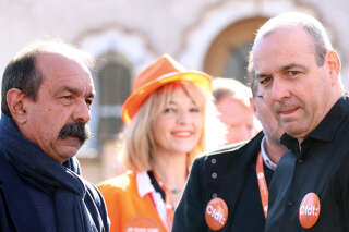 Union leaders Philippe Martinez (CGT, L) and Laurent Berger (CFDT, R)  get ready to take part in a demonstration on the fifth day of nationwide rallies organised since the start of the year, against a deeply unpopular pensions overhaul, in Albi, southwestern France, on February 16, 2023. (Photo by CHARLY TRIBALLEAU / AFP)