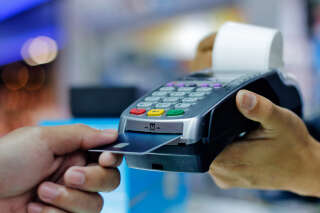 Man make payment with credit card swipe through terminal. customer paying with EDC machine. buy and sell product or service