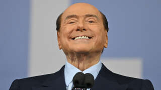 (FILES) In this file photo taken on September 22, 2022 Forza Italia leader Silvio Berlusconi speaks on stage on September 22, 2022 during a joint rally of Italy's right-wing parties Brothers of Italy (Fratelli d'Italia, FdI), the League (Lega) and Forza Italia at Piazza del Popolo in Rome, ahead of the September 25 general election. - Former Italian Prime Minister Silvio Berlusconi was in intensive care on April 5, 2023 for heart problems, a member of his entourage told AFP. (Photo by Alberto PIZZOLI / AFP)