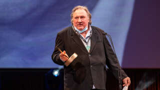 French actor Gerard Depardieu receives a career achievement award at the El Gouna Film Festival in the Egyptian Red Sea resort of el Gouna on October 23, 2020. (Photo by Ammar Abd RABBO / El Gouna Film Festival / AFP) / XGTY / RESTRICTED TO EDITORIAL USE - MANDATORY CREDIT 