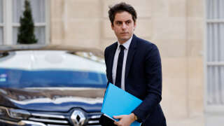 French Junior Minister for Public Accounts Gabriel Attal arrives for a crisis meeting on the eve of another major day of strikes and protests against the government's controversial pension reform, at the Elysee Palace in Paris on March 27, 2023. - The French President summoned Prime Minister, other cabinet ministers and senior lawmakers for a crisis meeting as tensions ran high with a 10th such mobilisation since protests started in mid-January against the controversial pension law. Nearly two weeks after he rammed the new law through parliament using a special provision sidestepping any vote, unions have vowed no let-up in mass protests to get the government to back down. (Photo by Ludovic MARIN / AFP)