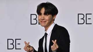 (FILES) In this file photo taken on November 20, 2020 South Korean K-pop boy band BTS member J-Hope poses for a photo session during a press conference on BTS new album 'BE (Deluxe Edition)' in Seoul. - BTS star J-Hope was set to start his mandatory South Korean military service on April 18, 2023 local media reported, the second member to report for duty since the K-pop juggernaut went on hiatus last year. (Photo by Jung Yeon-je / AFP)
