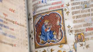 A photo shows a detail in the breviary of King Charles V of France (1338-1380), an illuminated manuscript from the 1370s, at the Richelieu site of the National Library of France (BNF) in Paris, on April 17, 2023. - A call for donations and patrons has been launched to bring back, 300 years after its departure, a 14th century book that is a precious testimony to the history of the kings of France. The BNF needs 1.6 million euros to buy the 