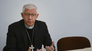(FILES) Strasbourg Archbishop Luc Ravel speaks during a press conference on November 22, 2018 at the Strasbourg archbishopric regarding the case of alleged children sexual abuses by a priest. - Archbishop Luc Ravel of Strasbourg, who had been targeted by an inspection ordered by the Vatican after criticisms of its governance, announced his resignation in a statement sent to AFP on April 20, 2023. (Photo by SEBASTIEN BOZON / AFP)