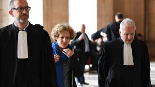 French lawyer for the French Association of Victims of Terrorism (AFVT) David Pere (L),  Corinne Adler, a victim who was 13 at the time, and French lawyer for the French Association of Victims of Terrorism (AFVT) Antoine Casubolo Ferro attend the opening of the trial in absentia of the accused of the 1980 bombing of the Copernic street synagogue, at the Palais de Justice courthouse in Paris, on April 3, 2023. - Forty-three years after the bombing of the Rue Copernic synagogue in Paris, which killed four people and injured dozens in October 1980, the trial opens on April 3, 2023, in France, but without the sole defendant, Hassan Diab. The 69-year-old Lebanese-Canadian academic is not expected to appear at the opening of the trial before the special Paris assize court, which has jurisdiction over terrorism cases, and will therefore try him in absentia. (Photo by BERTRAND GUAY / AFP)