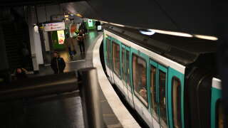 A commuter sits in a carriage at the Gare de l'Est metro station in Paris, on March 7, 2023, as fresh strikes and protests are planned against the government's controversial pensions reform. - Unions have vowed to bring the country to a standstill over the proposed changes, which include raising the retirement age from 62 to 64 and increasing the number of years workers have to make contributions for a full pension. (Photo by Christophe ARCHAMBAULT / AFP)
