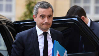French Interior Minister Gerald Darmanin arrives at the Hotel Matignon in Paris for a meeting with French Prime Minister and New Caledonia's elected representatives on the territory's institutional future, in Paris on April 11, 2023. (Photo by Alain JOCARD / AFP)
