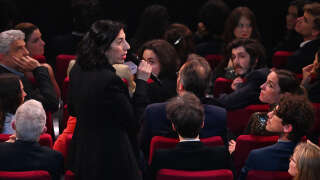France's Culture Minister Rima Abdul-Malak (C) argues with members of the General Confederation of Labour (CGT) after they appeared on stage and delivered a speech during the 34th Moliere awards ceremony, France's highest theatre honour, at the Theatre de Paris in Paris on April 24, 2023. (Photo by Emmanuel DUNAND / AFP)