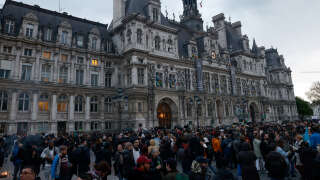 Protesters gather in front of Paris' city hall during a demonstration organised by the 