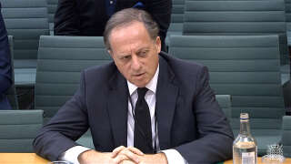 (FILES) In this file video grab taken from footage broadcast by the UK Parliament's Parliamentary Recording Unit (PRU) on February 7, 2023 shows BBC chairperson Richard Sharp testifying in front of a Digital, Culture, Media and Sport (DCMS) Committee in London - Sharp announced his resignation on April 28, 2023 over involvement in securing a private credit line for up to £800,000 ($990,000) for the then-PM Boris Johnson from a Canadian businessman. (Photo by Handout / PRU / AFP) / RESTRICTED TO EDITORIAL USE - MANDATORY CREDIT 