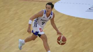 France's Celine Dumerc runs with the ball during a friendly basketball match between France and Ukraine on May 31, 2017 in Villenave d'Ornon, southwestern France. (Photo by NICOLAS TUCAT / AFP)