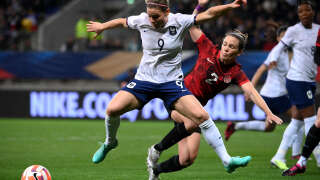 France's forward Eugenie Le Sommer (L) fights for the ball with Canada's defender Allysha Chapman during the women's international friendly football match between France and Canada at the Marie Marvingt Stadium, in Le Mans, northwestern France, on April 11, 2023. (Photo by FRANCK FIFE / AFP)